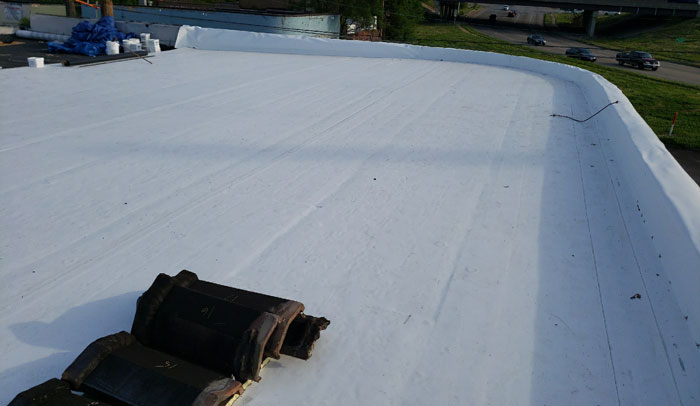 white flat roof on commercial building