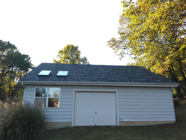 new roofing and siding on a house